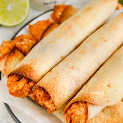 cheese and Chicken Taquitos on a plate
