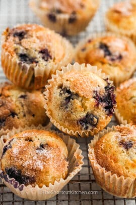 Easy Blueberry Muffins baked on a cooling rack
