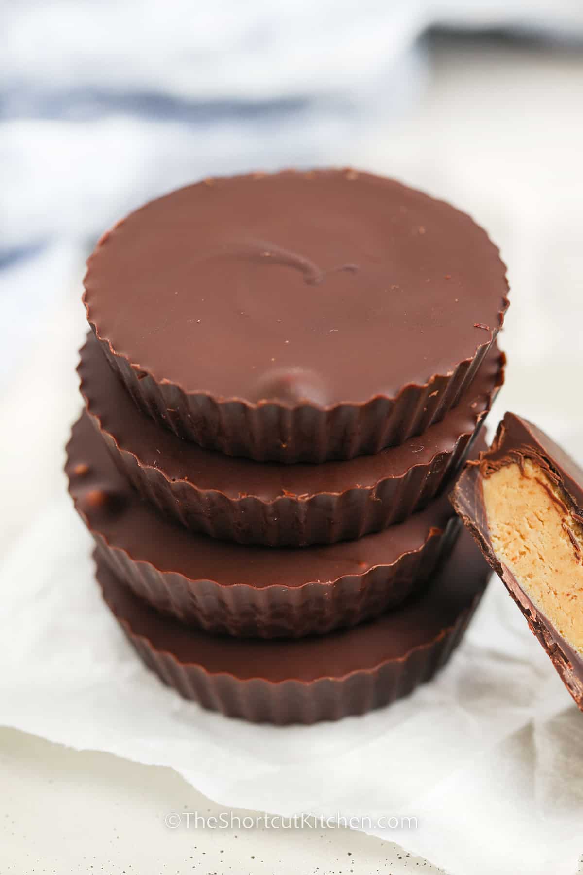 Four homemade peanut butter cups stacked