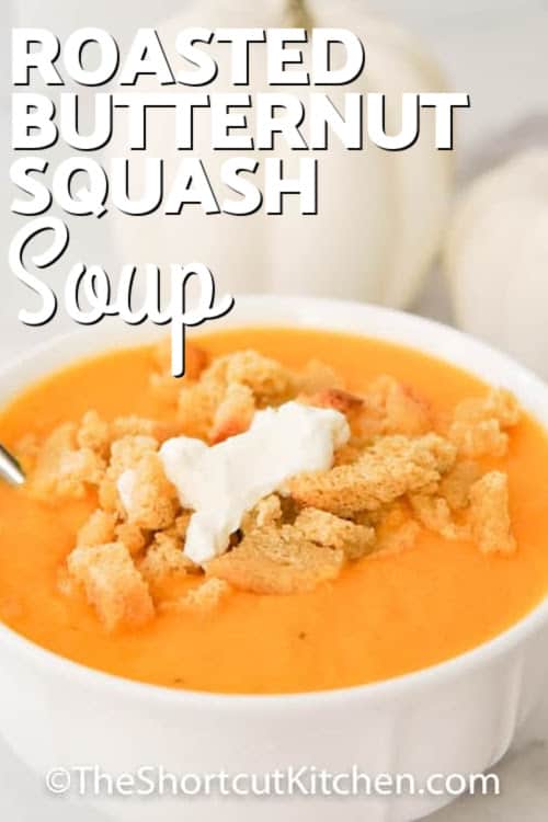 A bowl of butternut squash soup with text