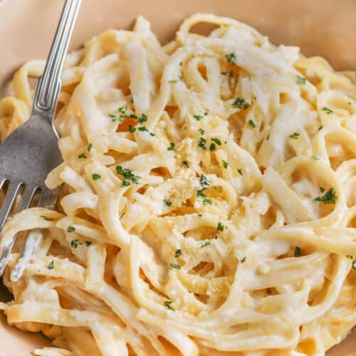 a serving of fettuccine alfredo in a bowl