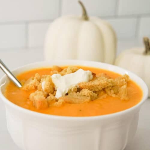 white bowl filled with roasted butternut squash soup