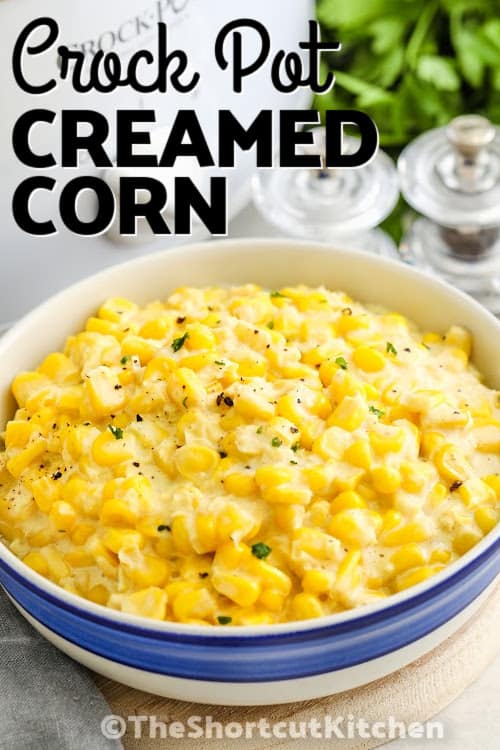 A bowl of crockpot creamed corn with text