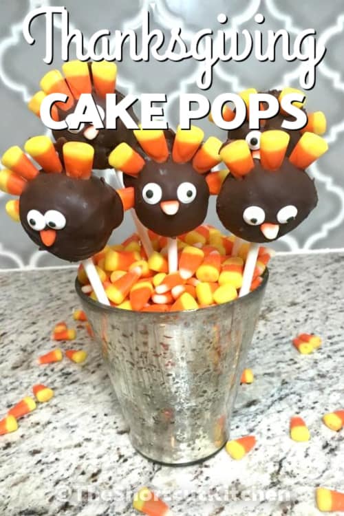 Thanksgiving cake pops in a jar with candy corn and writing