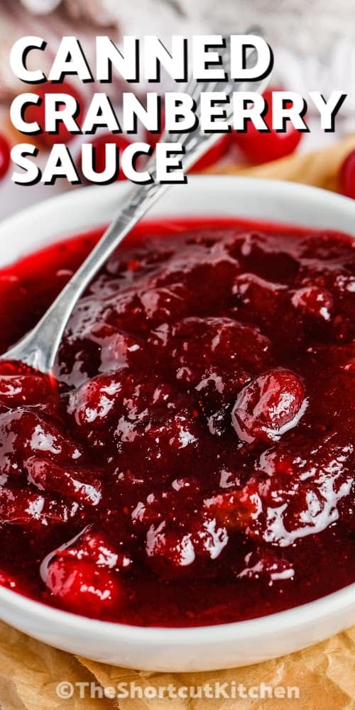 A serving dish of canned cranberry sauce with a title