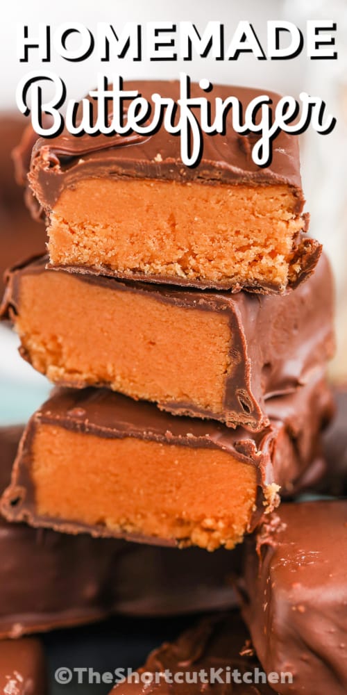 homemade butterfinger cut in half to show the middle with writing