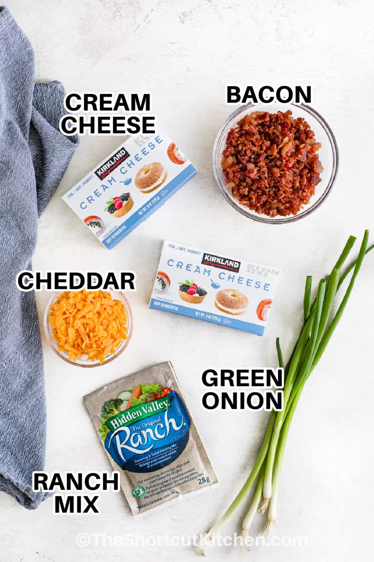 ingredients for Bacon Ranch Cheese Ball including bacon, cream cheese, cheddar, green onion, and ranch mix