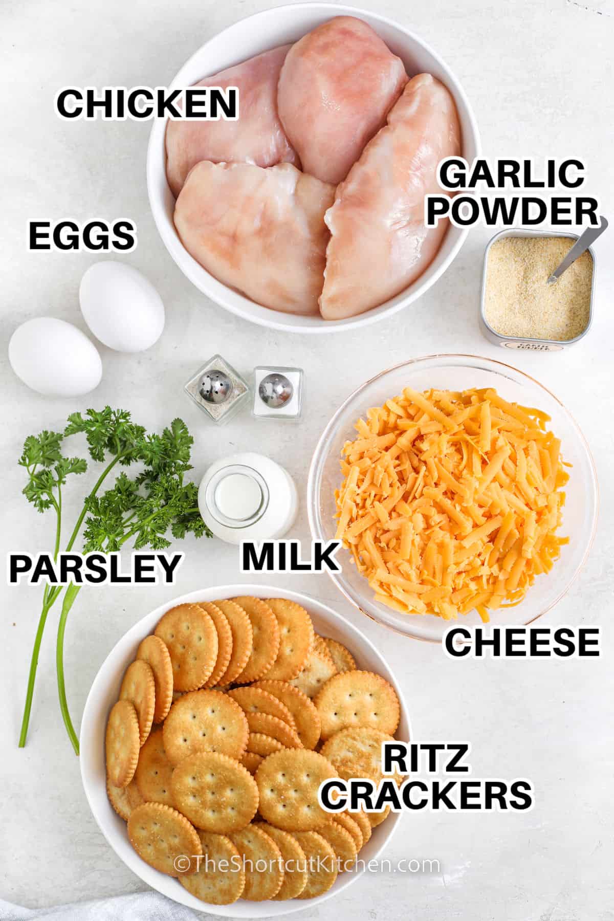 chicken , eggs , garlic powder , cheese , milk , parsley and ritz crackers with labels to make Ritz Cracker Chicken