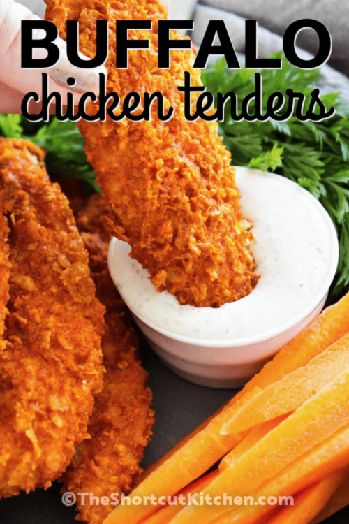 Crispy buffalo chicken tenders, one dipped into dressing, with a title.