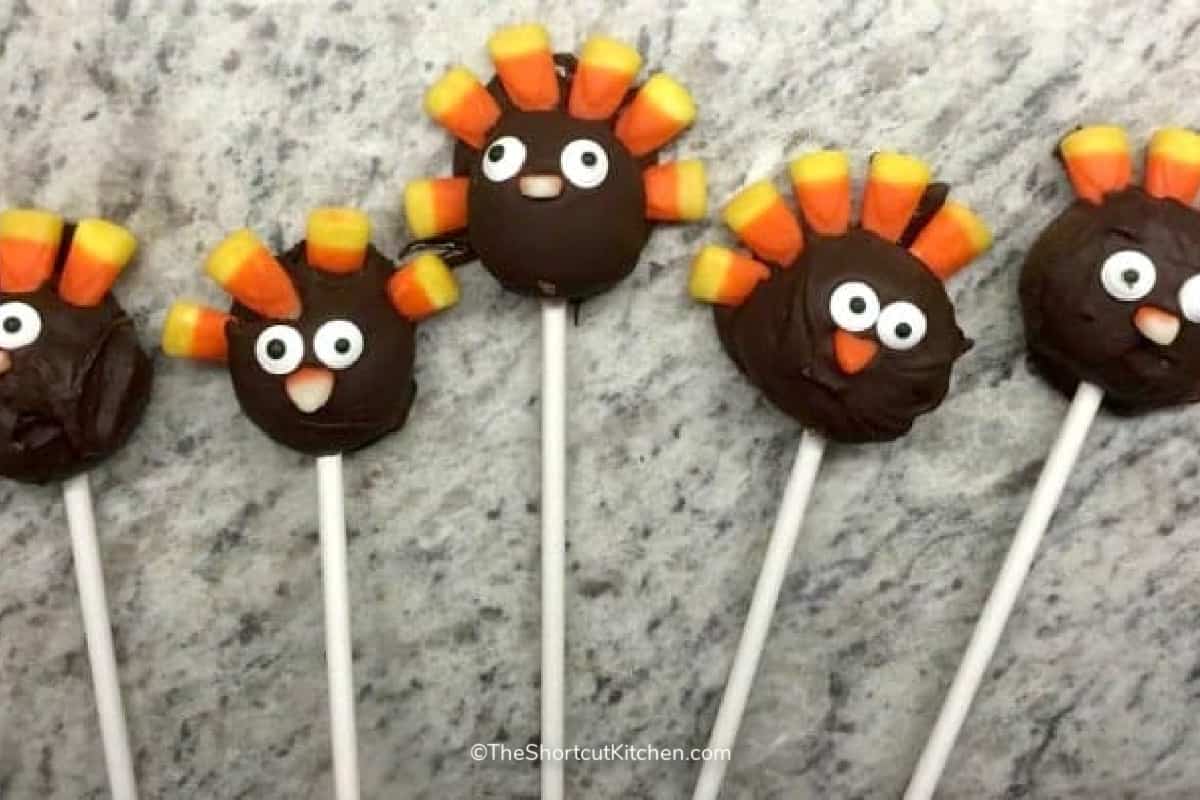 Thanksgiving cake pops on a marble board
