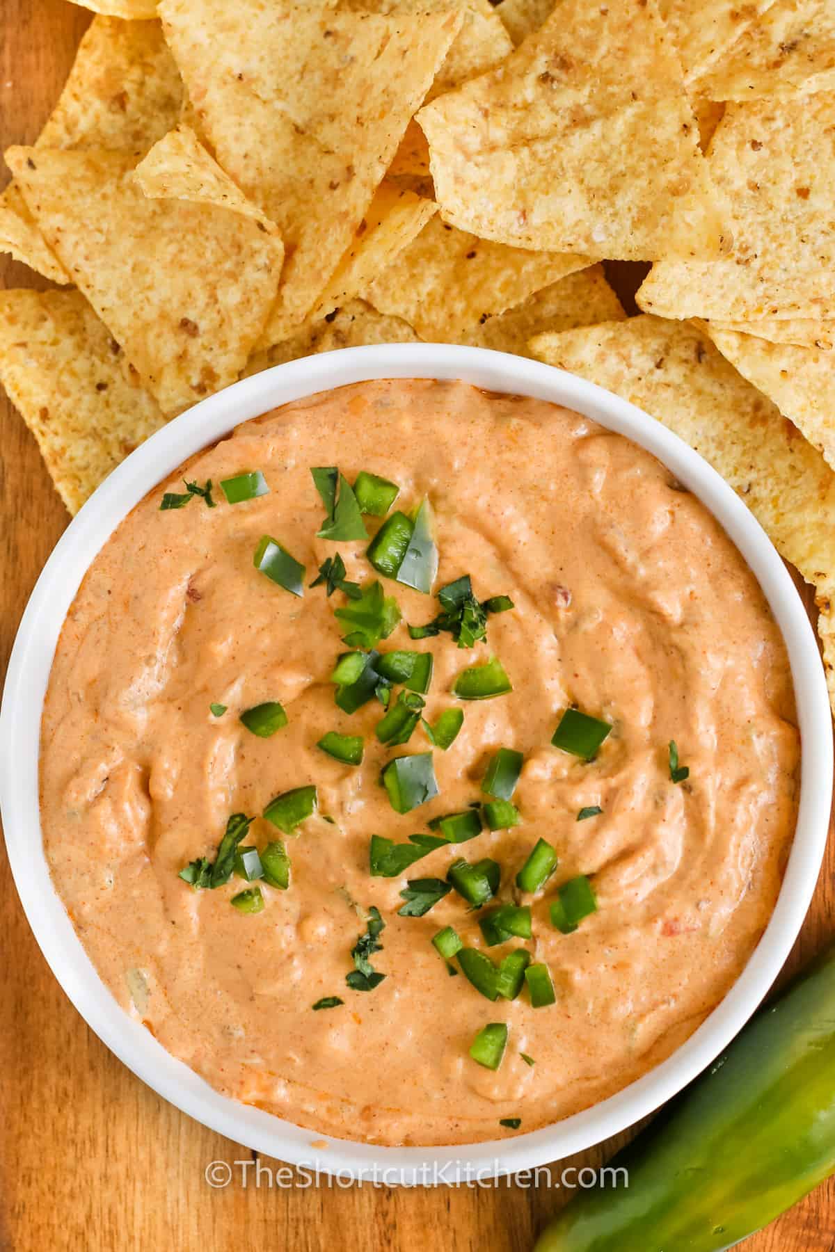 Chili Cheese Dip Recipe in a bowl with chips