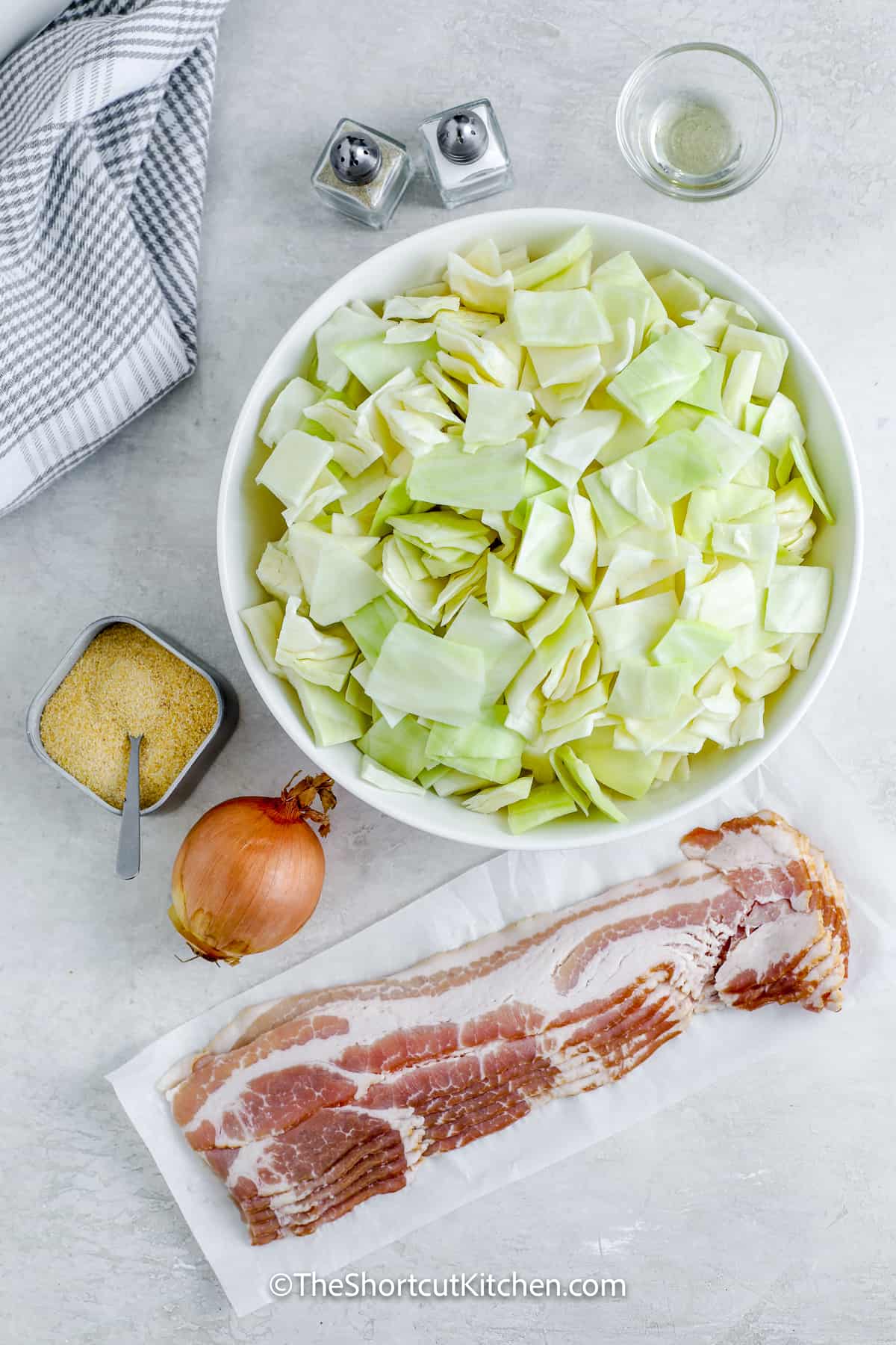 ingredients assembled to make fried cabbage with bacon