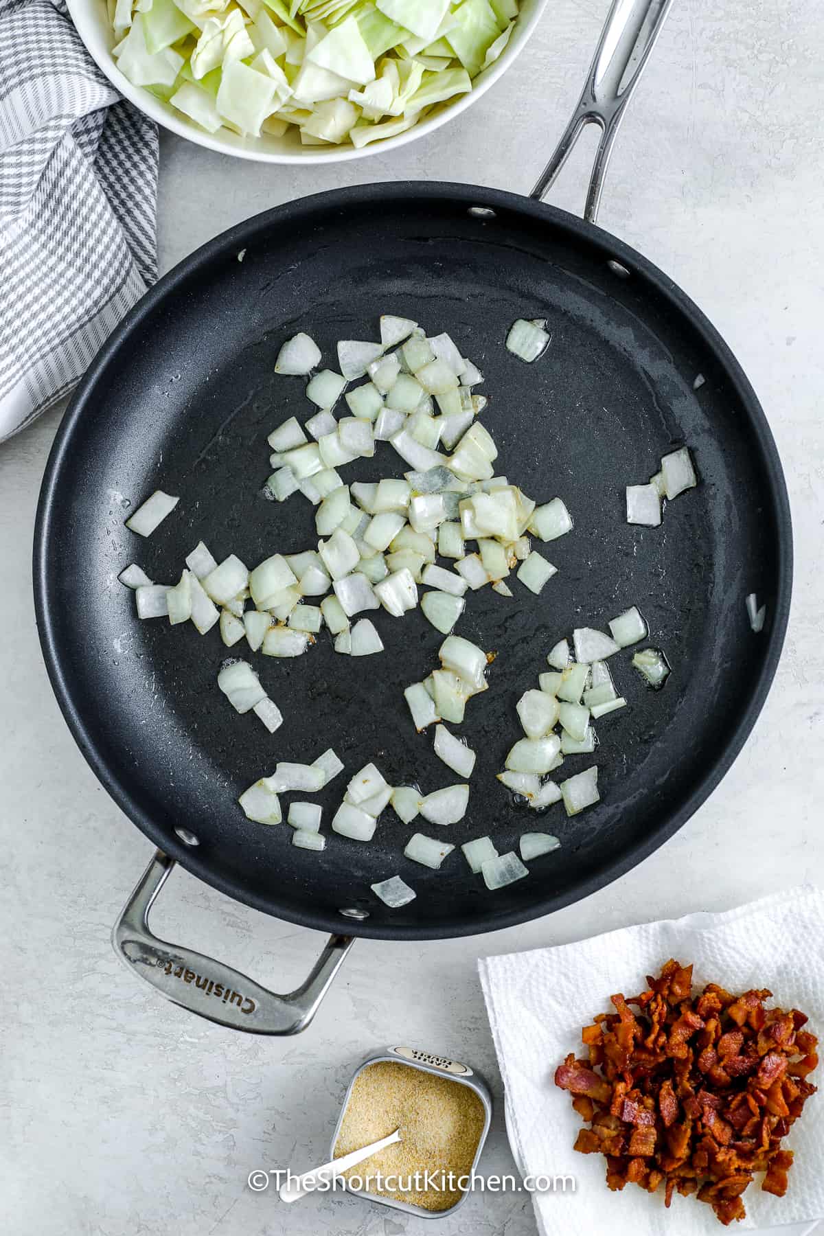 onions cooing in a frying pan