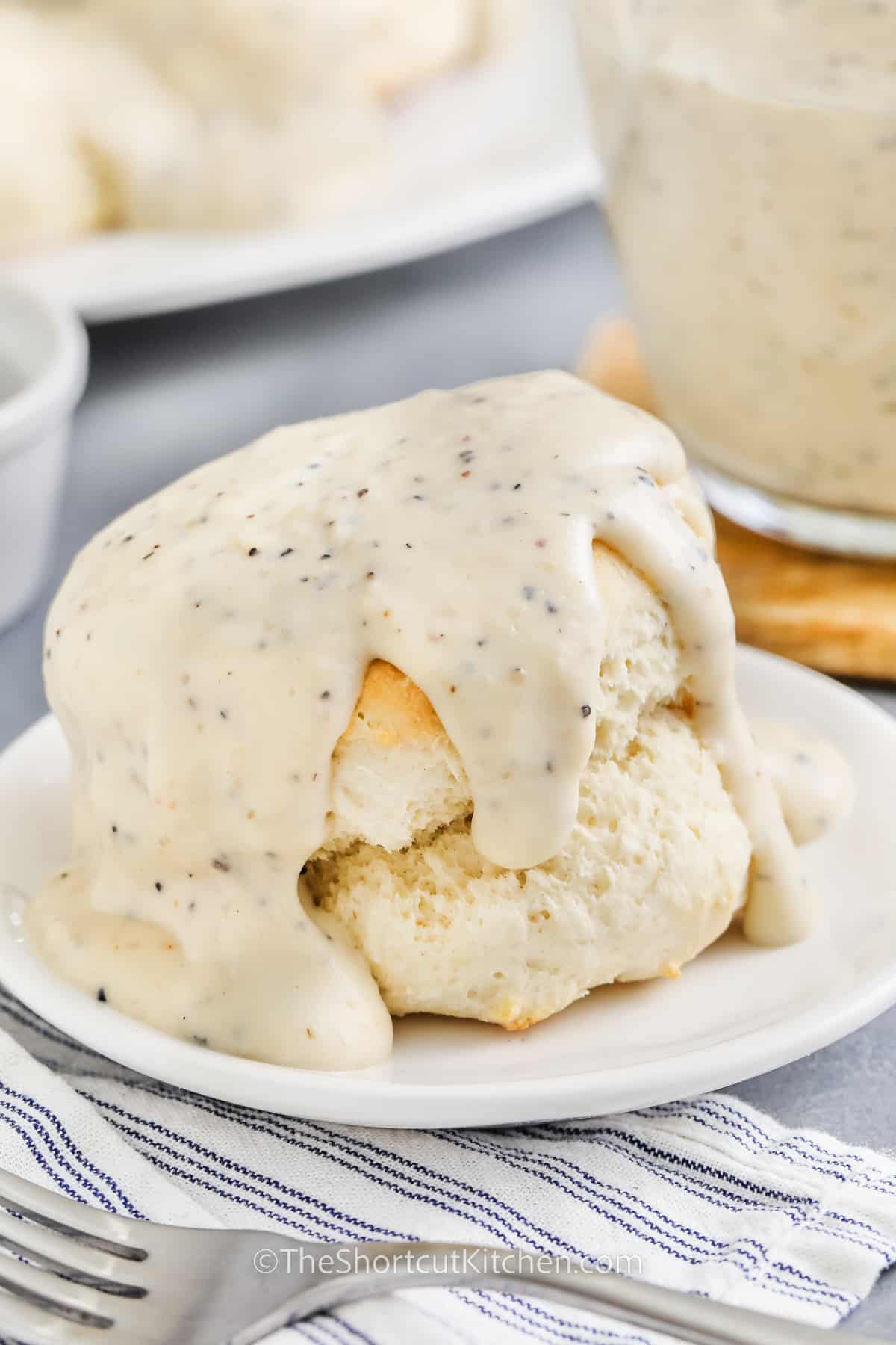 plated Pepper Gravy on biscuits