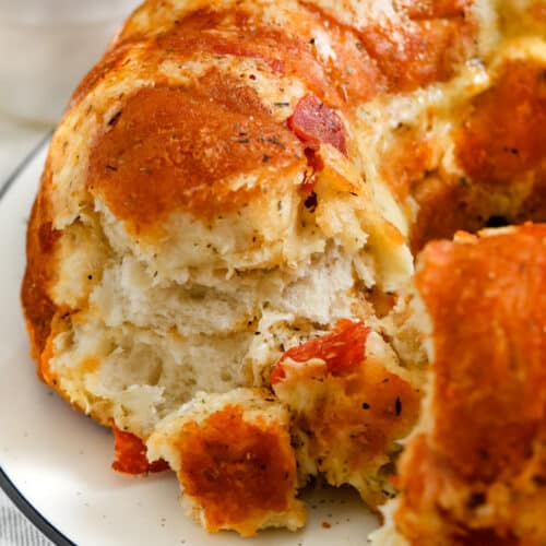 close up of Pull Apart Pizza Bread with bites taken out