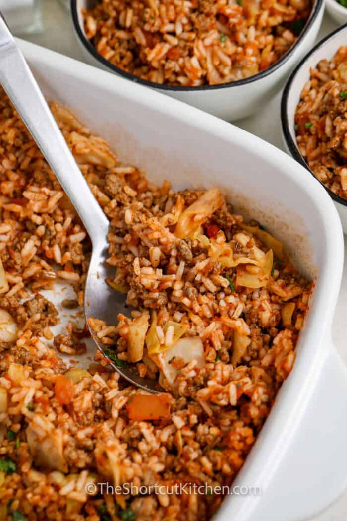Cabbage Roll Casserole being scooped into a bowl