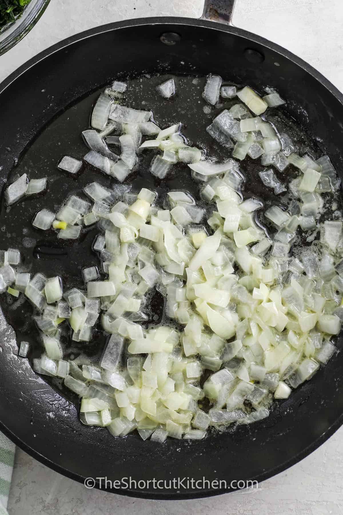 cooking onions to make Colcannon Recipe
