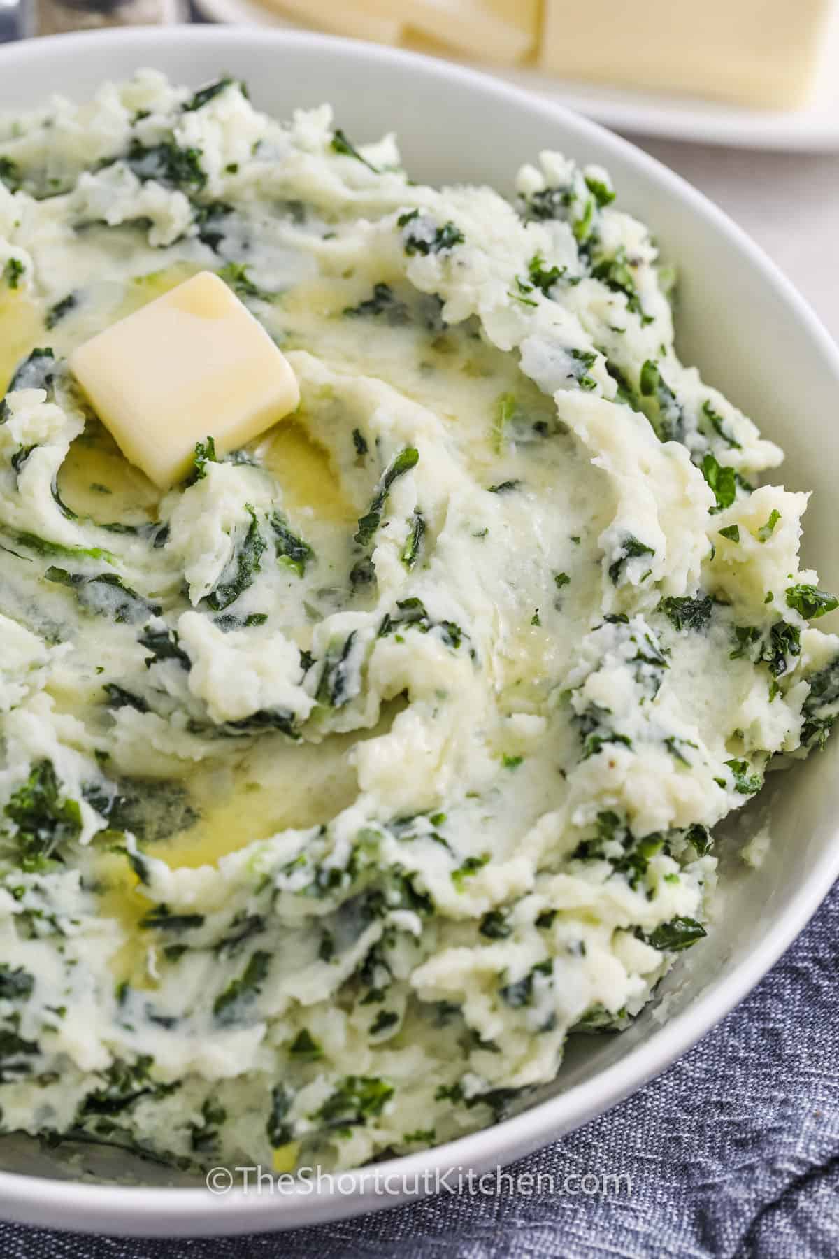 Colcannon Recipe in a bowl with butter