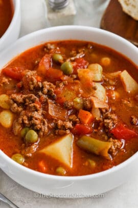 close up of ground beef soup in a bowl