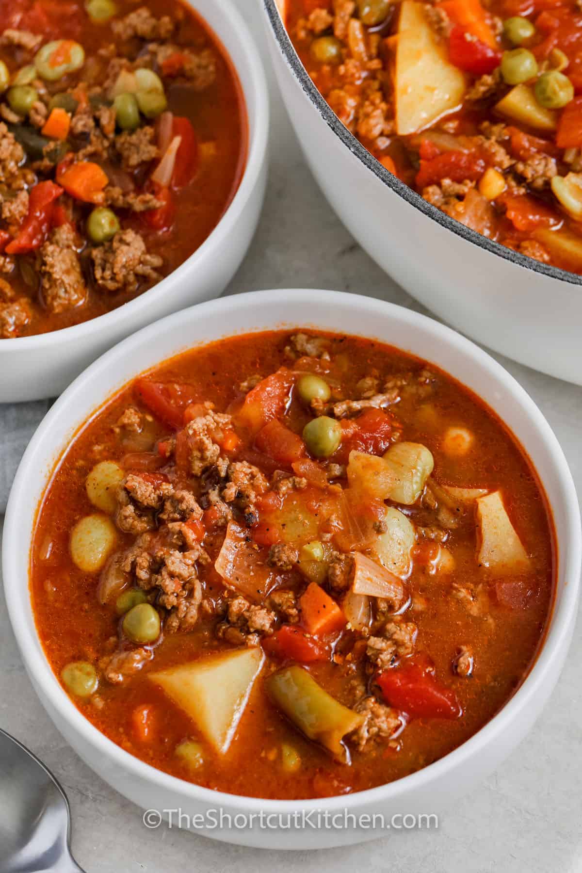 ground beef soup in white bowls