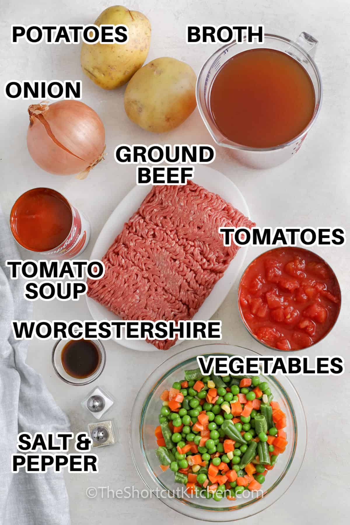 potatoes, broth, ground beef, onion, tomato soup, tomatoes, Worcestershire sauce, vegetables, salt and pepper with labels to make ground beef soup