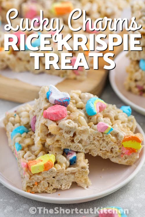 Two Lucky Charm Rice Krispie Treats on a plate with a title