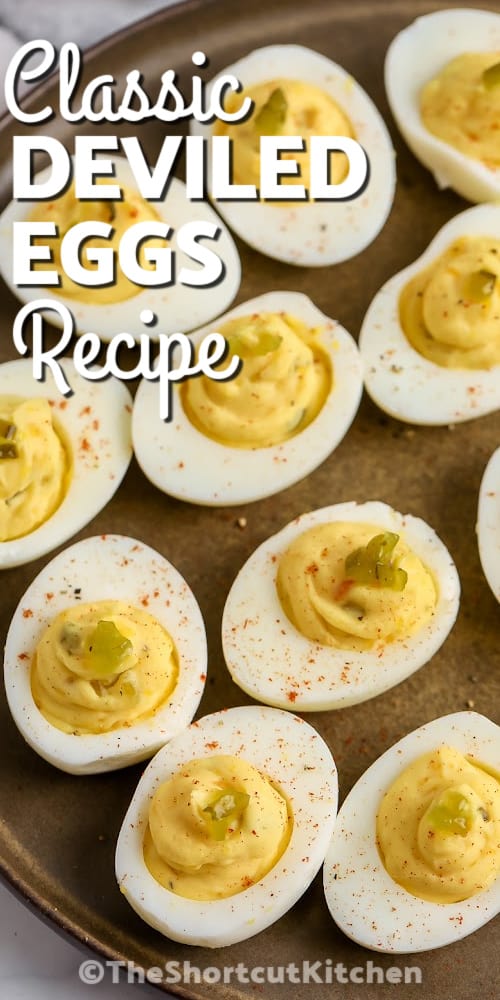 Classic deviled eggs prepared on a serving tray with text