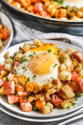 plated Breakfast Hash With Ham garnished with parsley