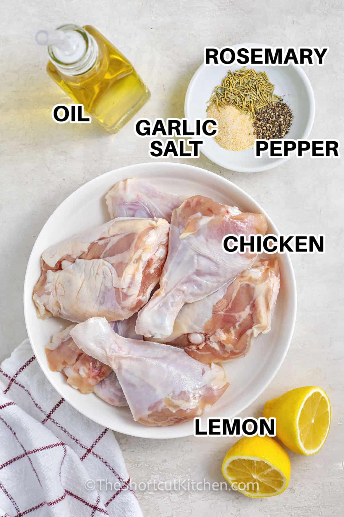 oil , garlic salt , pepper , rosemary , chicken and lemon to make Lemon Rosemary Chicken with labels