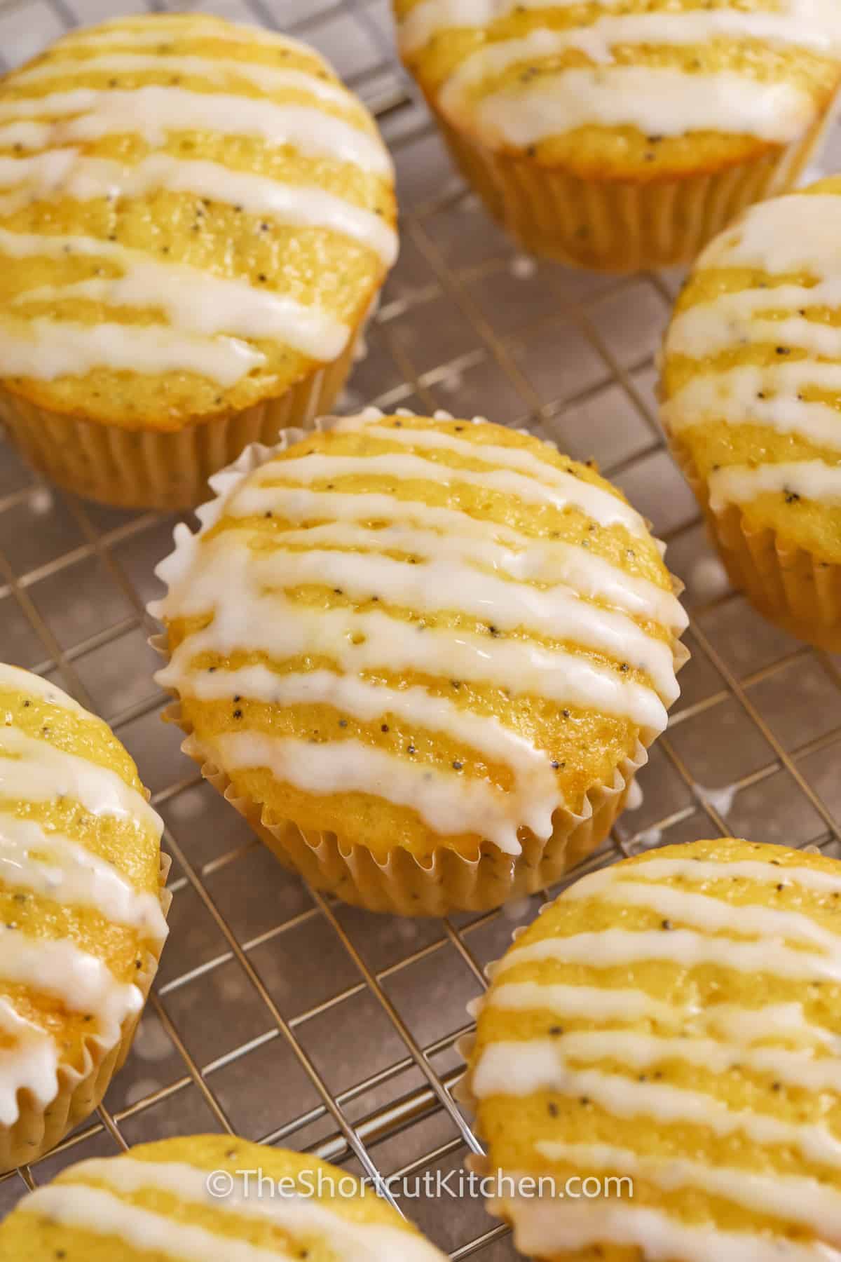 Lemon poppyseed muffins drizzled with glaze