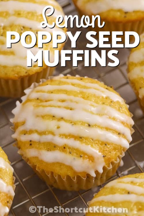 Lemon poppyseed muffins with powdered sugar drizzle with a title