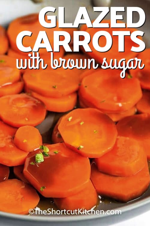 Brown sugar glazed carrots in a pan with a title