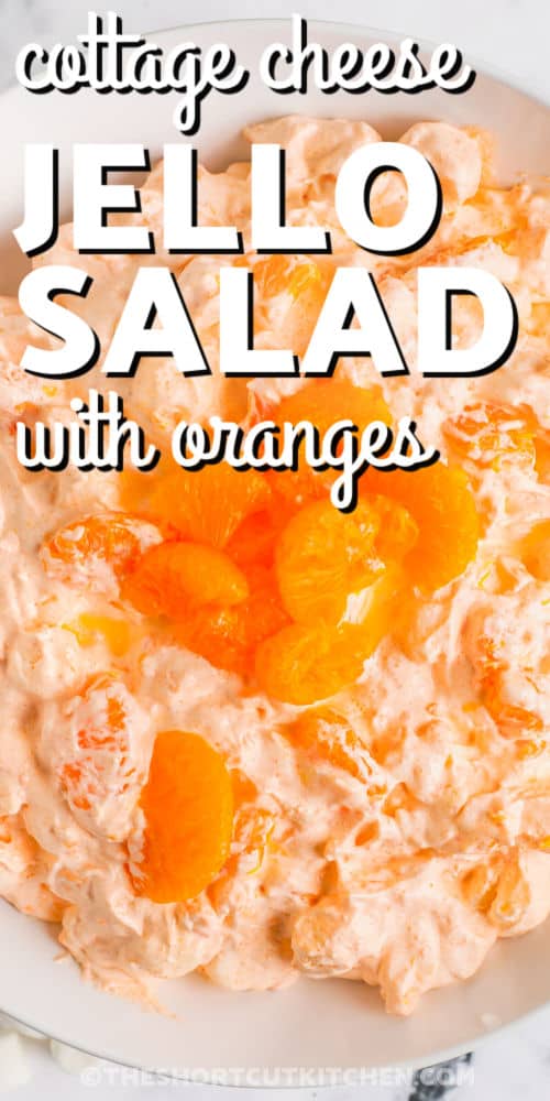 Cottage Cheese Orange Jello Salad in a bowl with writing