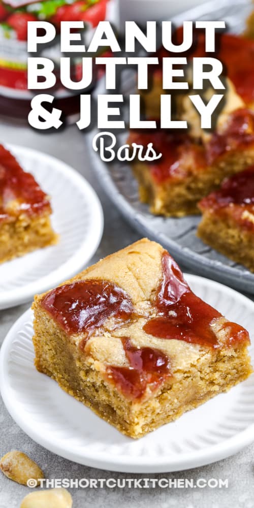 easy peanut butter and jelly bars on a white plate with a title