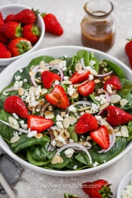 Spinach and Strawberry Salad in a white bowl
