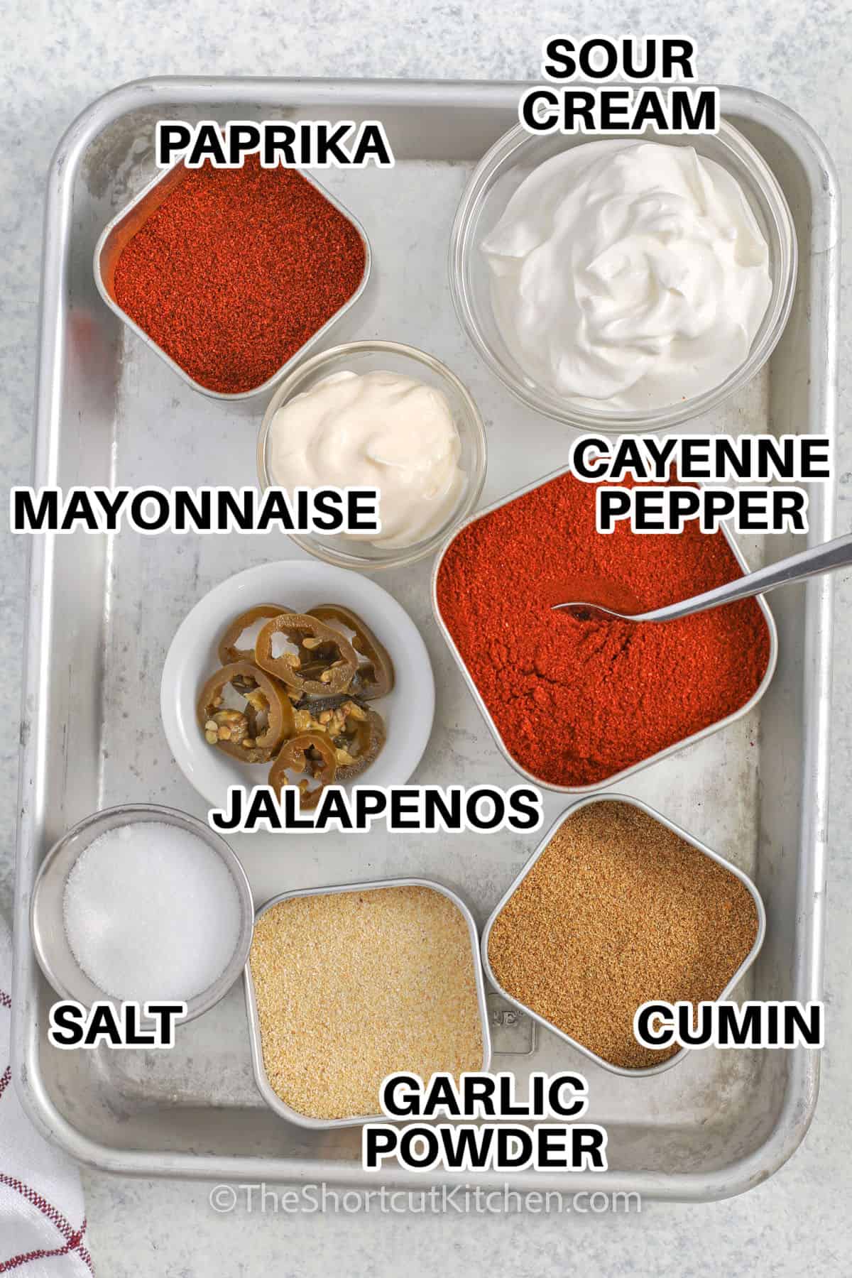 paprika , sour cream , cayenne pepper , mayonnaise , jalapeños , cumin , garlic powder and salt to make Copycat Taco Bell Quesadilla Sauce with labels