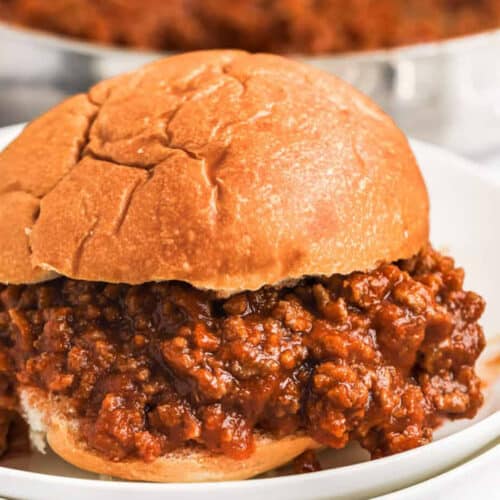 close up of Homemade Sloppy Joe Sauce in a bun on a plate