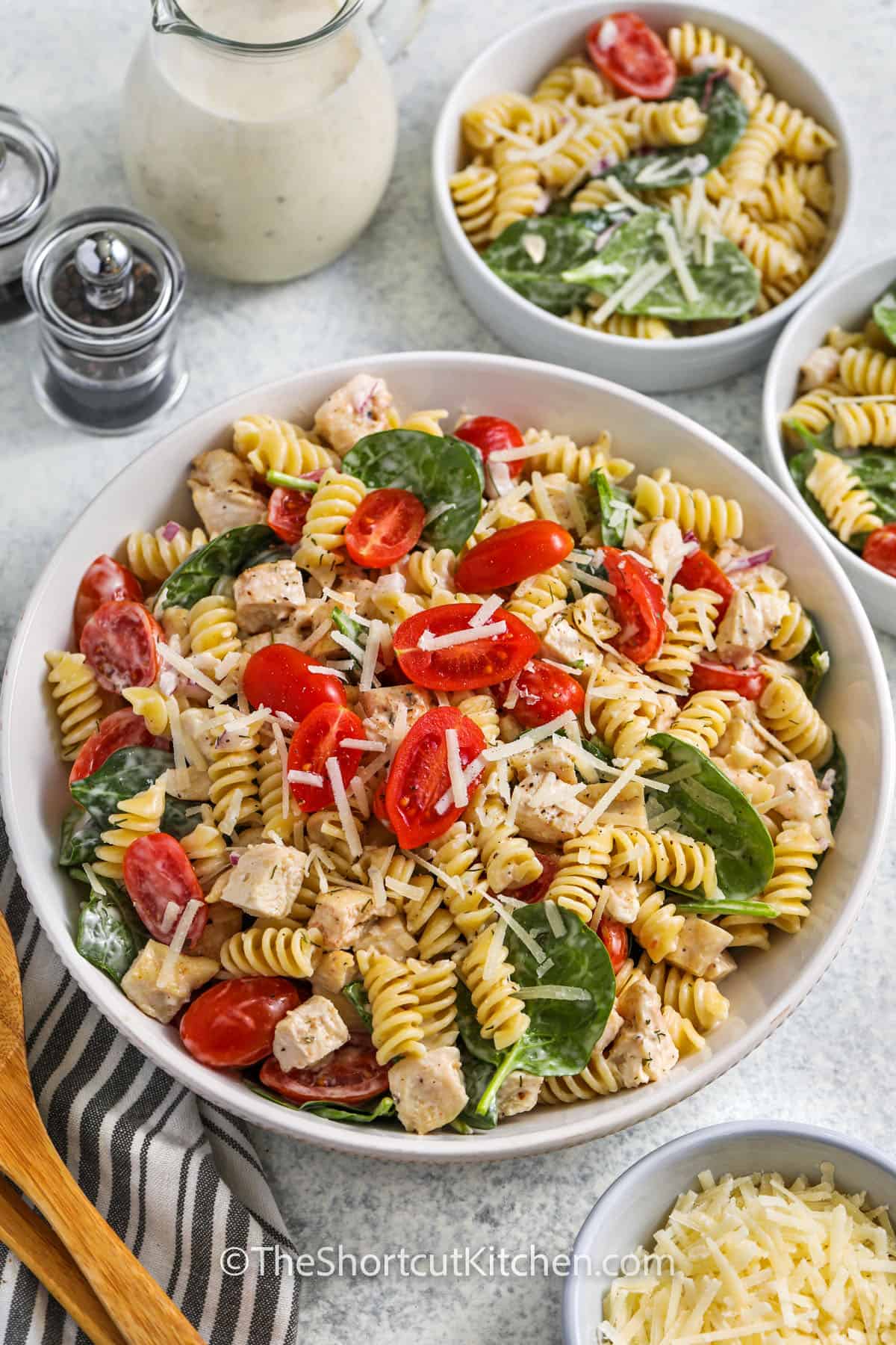 bowls of Chicken Pasta Salad with dressing