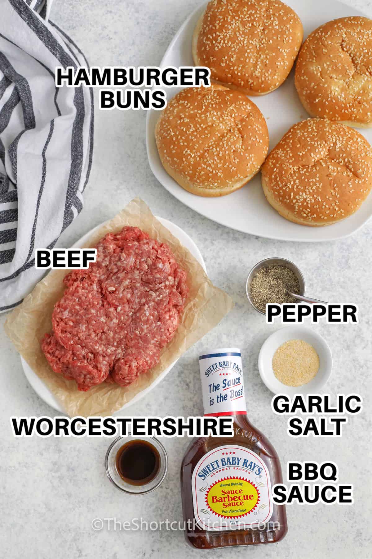 hamburger buns , beef , pepper , garlic salt , bbq sauce and Worcestershire with labels to make BBQ Grilled Burgers
