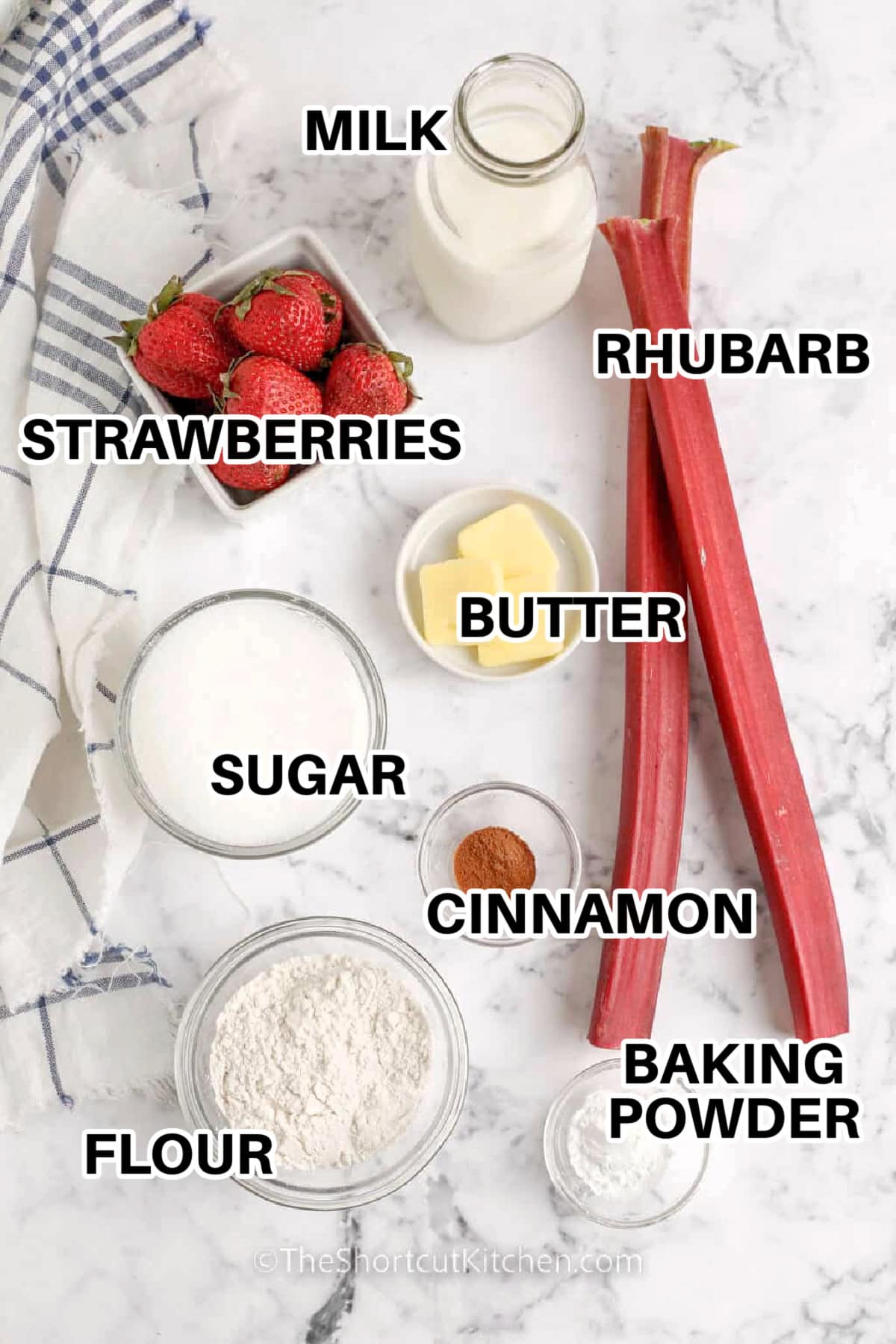 Strawberry rhubarb cobbler is an easy baked fruit dessert made with fresh strawberries, tangy rhubarb, sugar, and a buttery homemade batter. This easy cobbler has a soft golden topping, jammy fruit filling, and just enough cinnamon for cozy flavor. It is perfect for spring and summer baking and tastes incredible served warm with vanilla ice cream or whipped cream. #theshortcutkitchen Strawberry Rhubarb Cobbler Ingredients labeled: strawberries, rhubarb, sugar, flour, baking powder, cinnamon, salt, milk, and butter