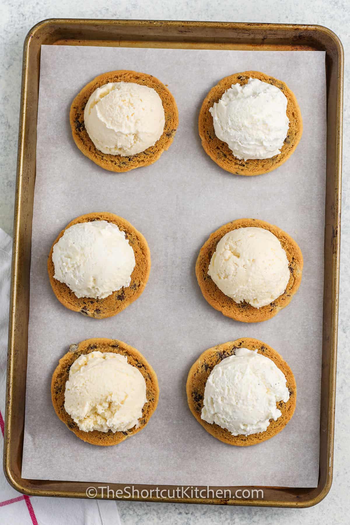 upside down cookies topped with ice cream