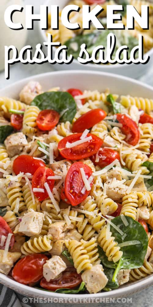 close up of Chicken Pasta Salad with tomatoes with a title