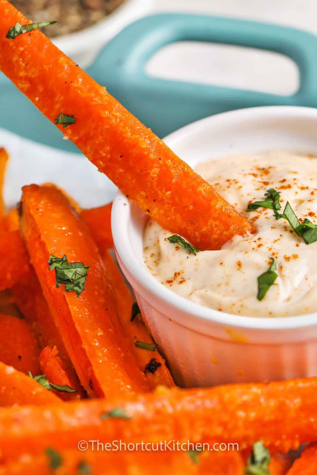 dipping Carrot Fries in dip