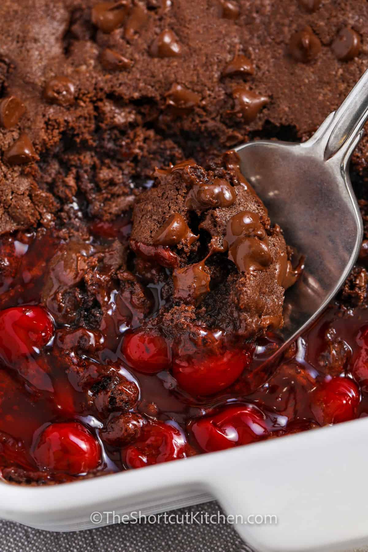 taking a spoonfull of Chocolate Cherry Dump Cake