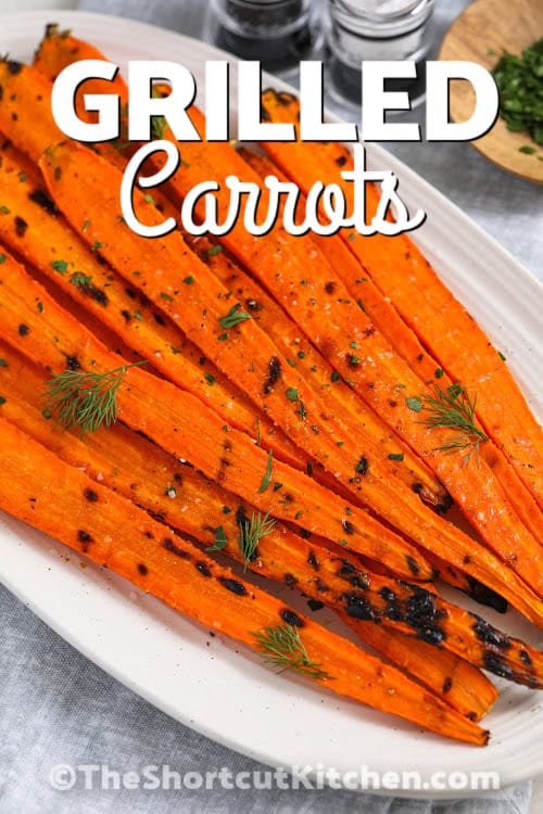 a plate of grilled carrots with a title