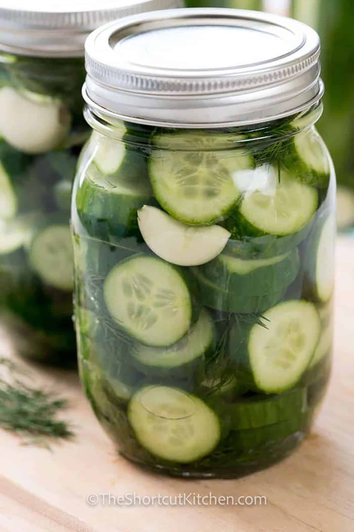 close up of Refrigerator Dill Pickle Recipe in a jar with a lid