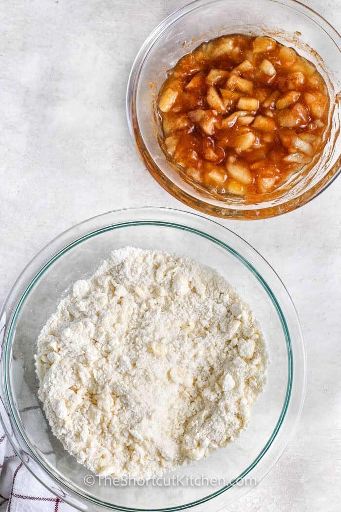 dry and wet ingredients in bowls to make Apple Pie Bars