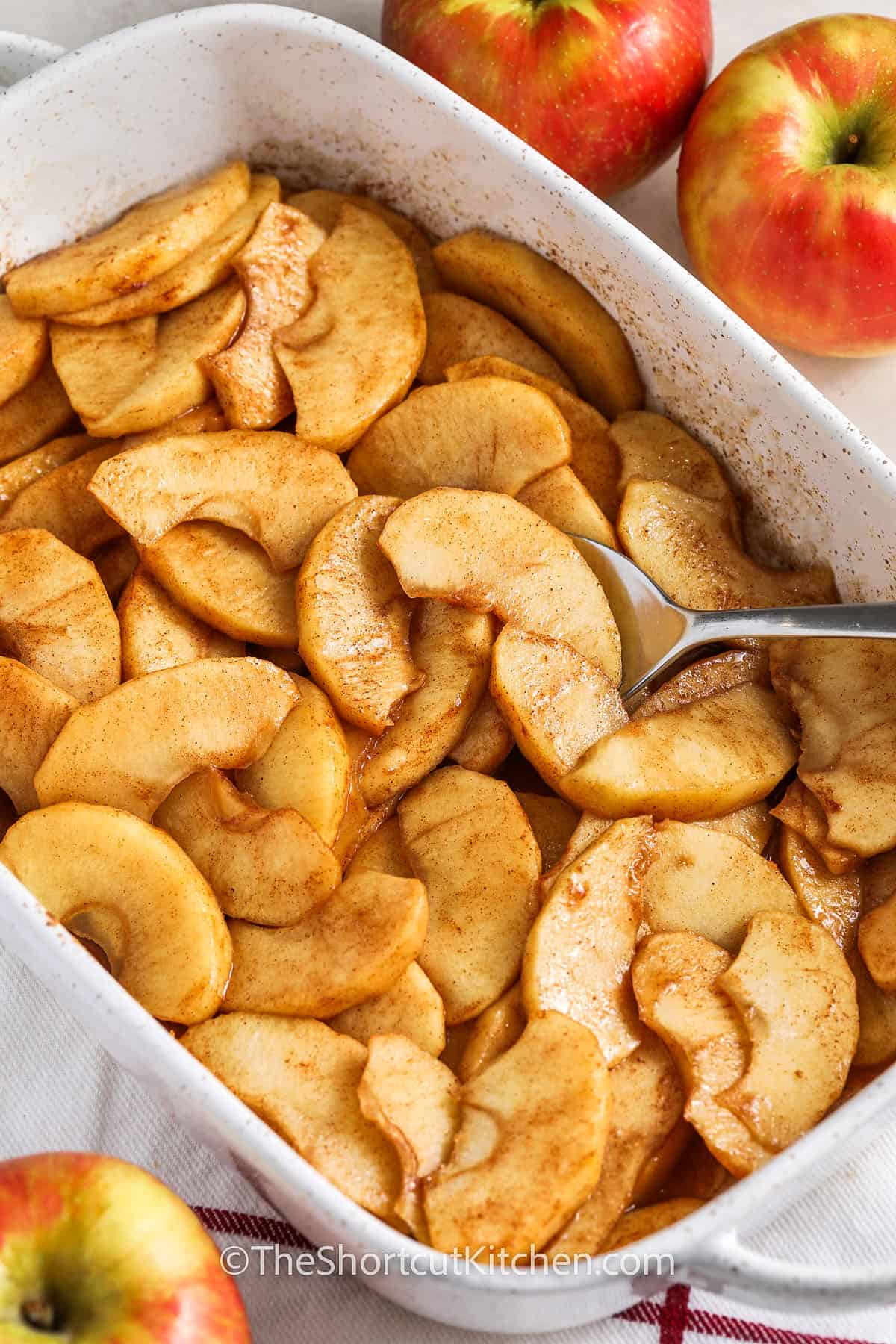 close up of Baked Apple Slices in a casserole dish