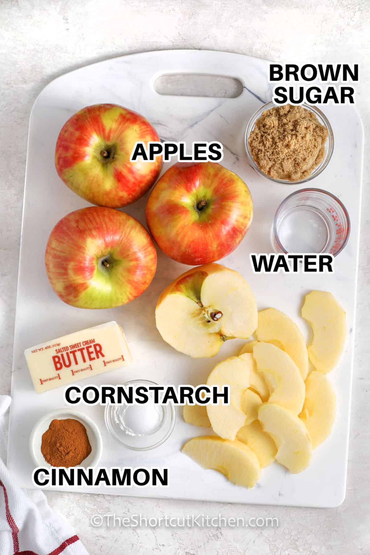 brown sugar , apples , water , cornstarch , cinnamon and butter with labels to make Baked Apple Slices