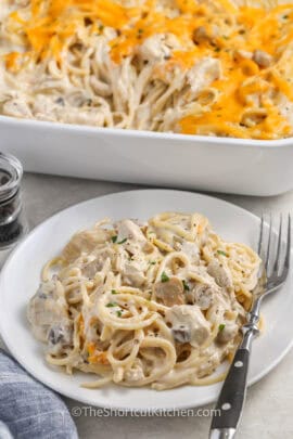 A serving of chicken tetrazzini on a plate with a fork